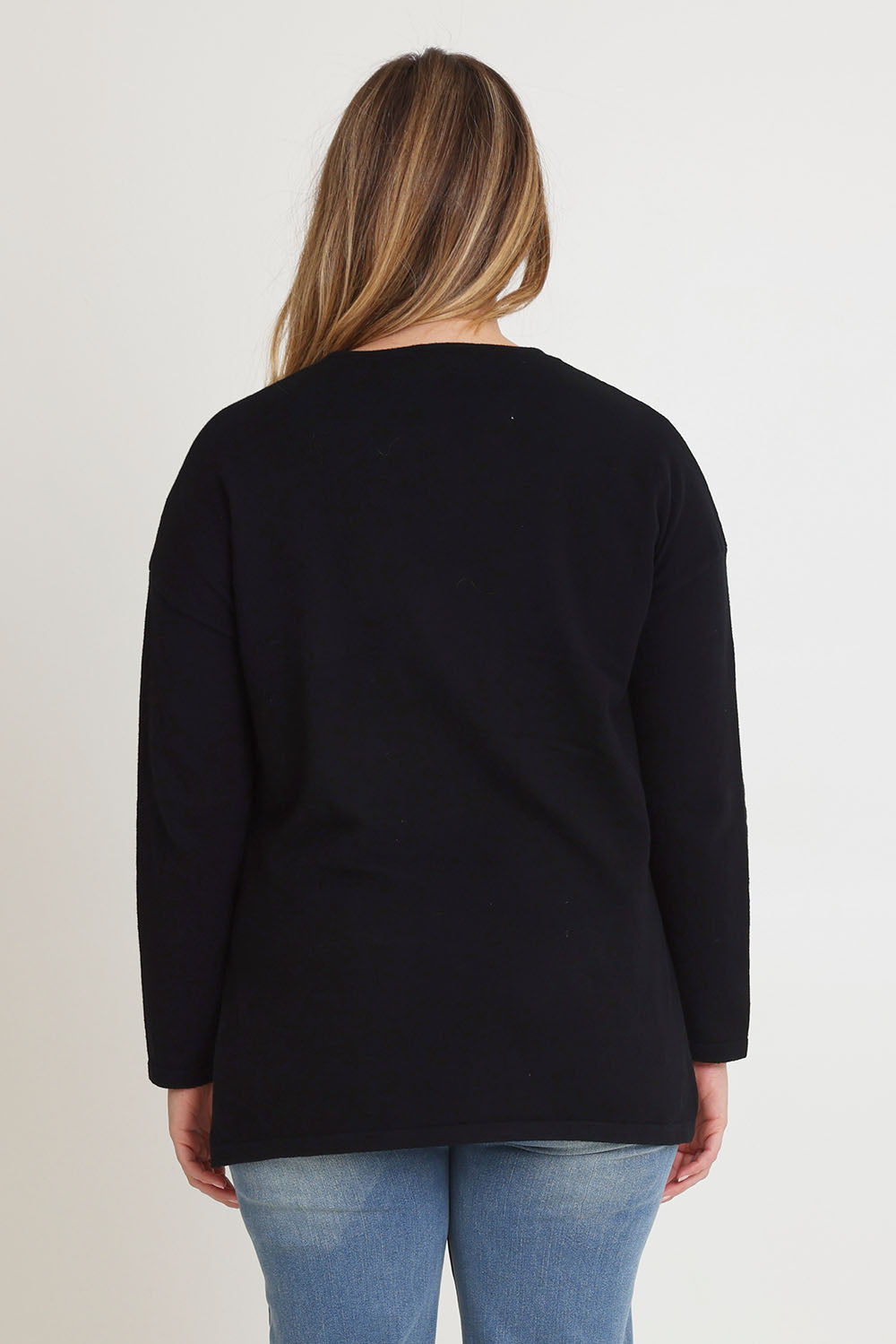 Model Chanel wearing size XL of the Cotton Cashmere Tunic in colour Black (Black), from the back