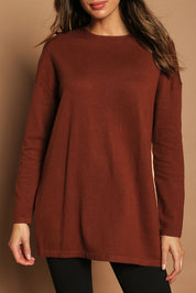 Model Madeline wearing size S of the Cotton Cashmere Tunic in colour Chestnut, from the front, cropped image