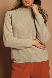 Model Madeline wearing size S of the Wool Cashmere Shoulder Cable Knit Sweater in colour Fawn, from the front, cropped image