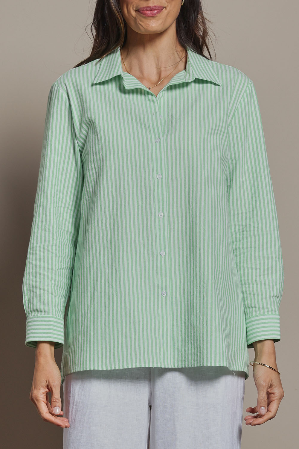 Model Amanda wearing size 10 of the Cotton Oversized Stripe Boyfriend Shirt in colour Green (Green), from the front, cropped image