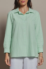 Model Amanda wearing size 10 of the Cotton Oversized Stripe Boyfriend Shirt in colour Green (Green), from the front, cropped image