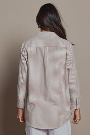 Model Amanda wearing size 10 of the Cotton Oversized Stripe Boyfriend Shirt in colour Latte, from the front, cropped image