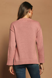 Model Madeline wearing size S of the Cotton Wool Cashmere Relaxed Jumper in colour Pink (Pink), from the back