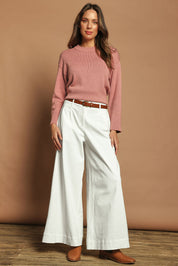 Model Madeline wearing size S of the Cotton Wool Cashmere Relaxed Jumper in colour Pink (Pink), from the front, showing the whole outfit