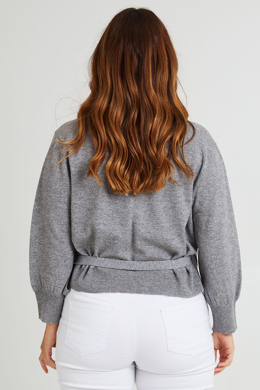 Model Laura wearing size L of the Wool Cashmere Wrap Sweater in colour Grey (Grey), from the back