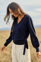 Model Amanda wearing size S of the Wool Cashmere Wrap Sweater in colour Peacoat (Blue), from the front, showing the whole outfit
