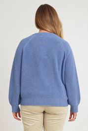 Model Chanel wearing size XL of the Wool Cashmere Sweater in colour Softblue (Blue), from the back
