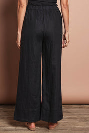 Model Amanda wearing size 10 of the Linen Drawstring Pant in colour Black (Black), from the back