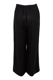 Product shot of the Linen Drawstring Pant in colour Black (Black), from the back