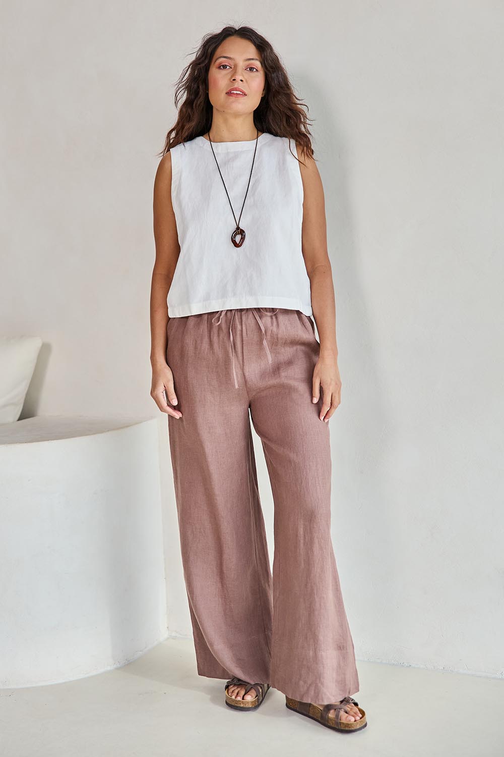 Model Tahneei wearing size 10 of the Linen Drawstring Pant – Coffee in colour Coffee, from the front