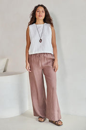 Model Tahneei wearing size 10 of the Linen Drawstring Pant – Coffee in colour Coffee, from the front