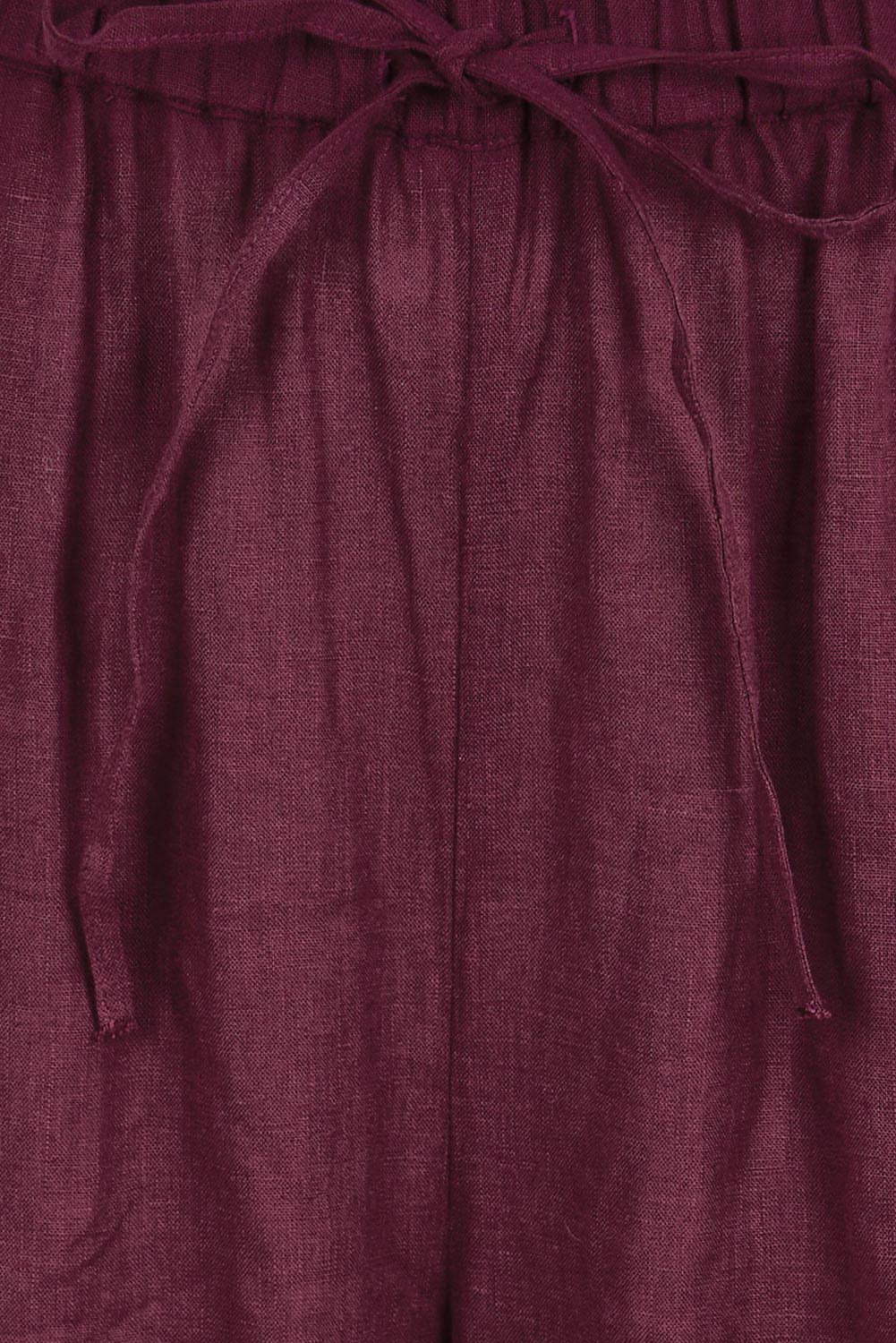 Product shot of the Linen Drawstring Pant – Plum in colour Plum, showing detail