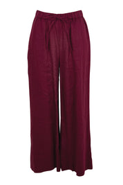 Product shot of the Linen Drawstring Pant – Plum in colour Plum, from the front