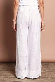 Model Amanda wearing size 10 of the Linen Drawstring Pant in colour White (White), from the back