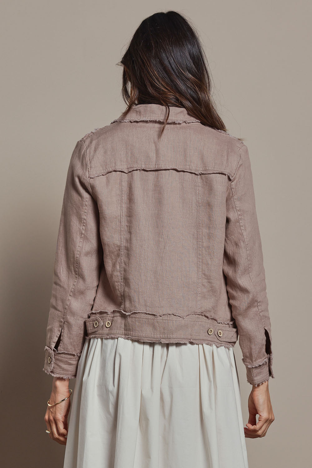 Model Amanda wearing size 10 of the Linen Relaxed Jacket in colour Latte, from the back