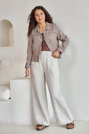 Model Tahneei wearing size 10 of the Linen Relaxed Jacket – Latte in colour Latte, from the front