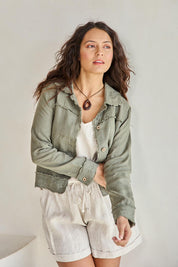 Model Tahneei wearing size 10 of the Linen Relaxed Jacket – Olive in colour Olive, in a cropped view