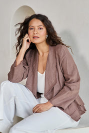 Model Tahneei wearing size 10 of the Linen Draped Jacket – Coffee in colour Coffee, in a cropped view