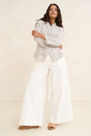 Model Tahneei wearing size 10 of the Linen Draped Jacket – Natural in colour Natural, from the front