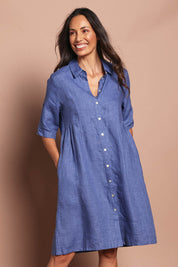 Model Amanda wearing size 10 of the Linen Shirt Maker Dress in colour Denim (Blue), from the front, cropped image