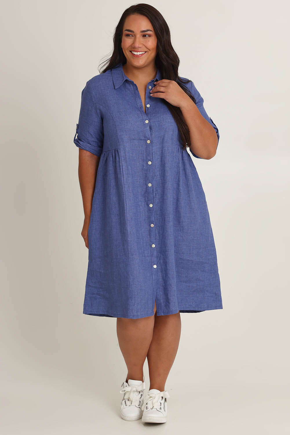 Model Ashleigh wearing size 16 of the Linen Shirt Maker Dress in colour Denim (Blue), from the front, showing the whole outfit