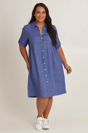 Model Ashleigh wearing size 16 of the Linen Shirt Maker Dress in colour Denim (Blue), from the front, showing the whole outfit