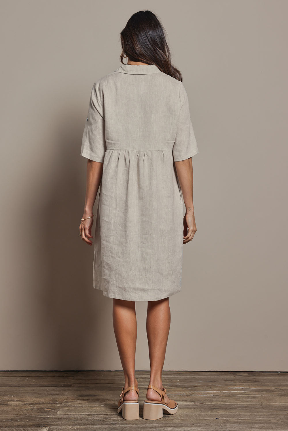 Model Amanda wearing size 10 of the Linen Shirt Maker Dress in colour Natural, from the back