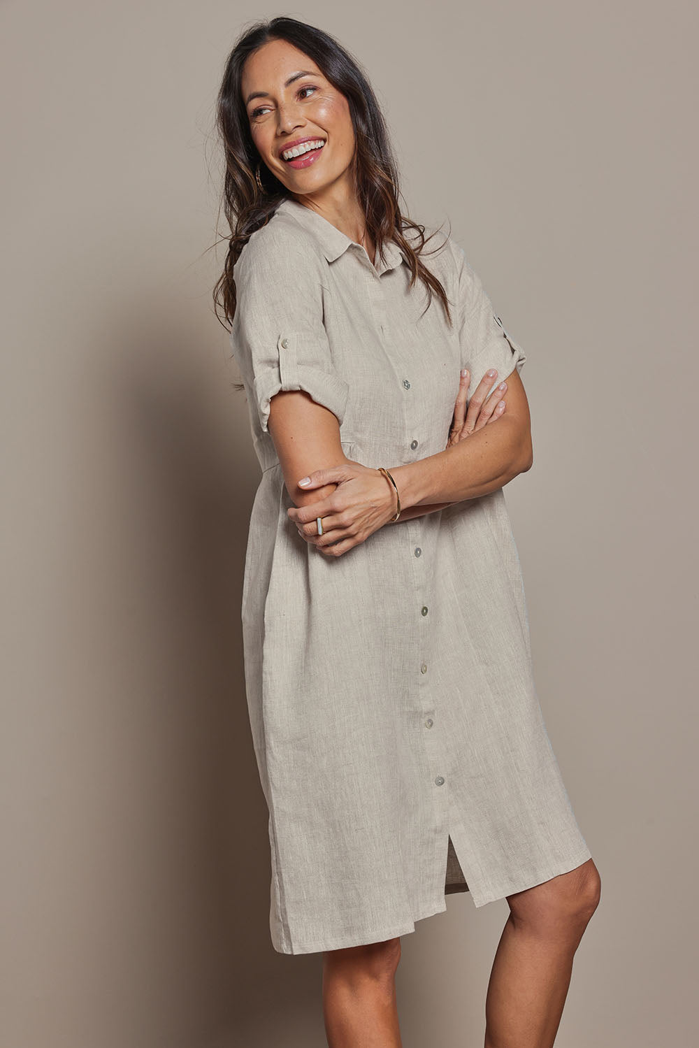 Model Amanda wearing size 10 of the Linen Shirt Maker Dress in colour Natural, from the front, cropped image
