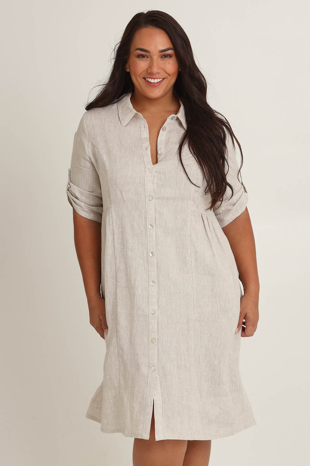 Model Ashleigh wearing size 16 of the Linen Shirt Maker Dress in colour Natural, from the front, cropped image