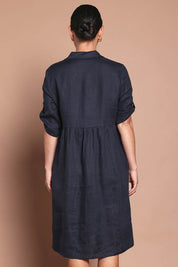 Model Katie wearing size 10 of the Linen Shirt Maker Dress in colour Navy (Blue), from the back