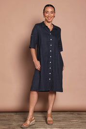 Model Katie wearing size 10 of the Linen Shirt Maker Dress in colour Navy (Blue), from the front, showing the whole outfit