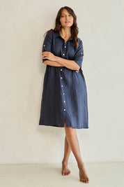 Model Tahnee wearing size 10 of the Linen Shirt Maker Dress in colour Navy (Blue), from the front, cropped image