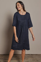 Model Amanda wearing size 10 of the Linen Pocket Dress in colour Navy (Blue), from the front, cropped image