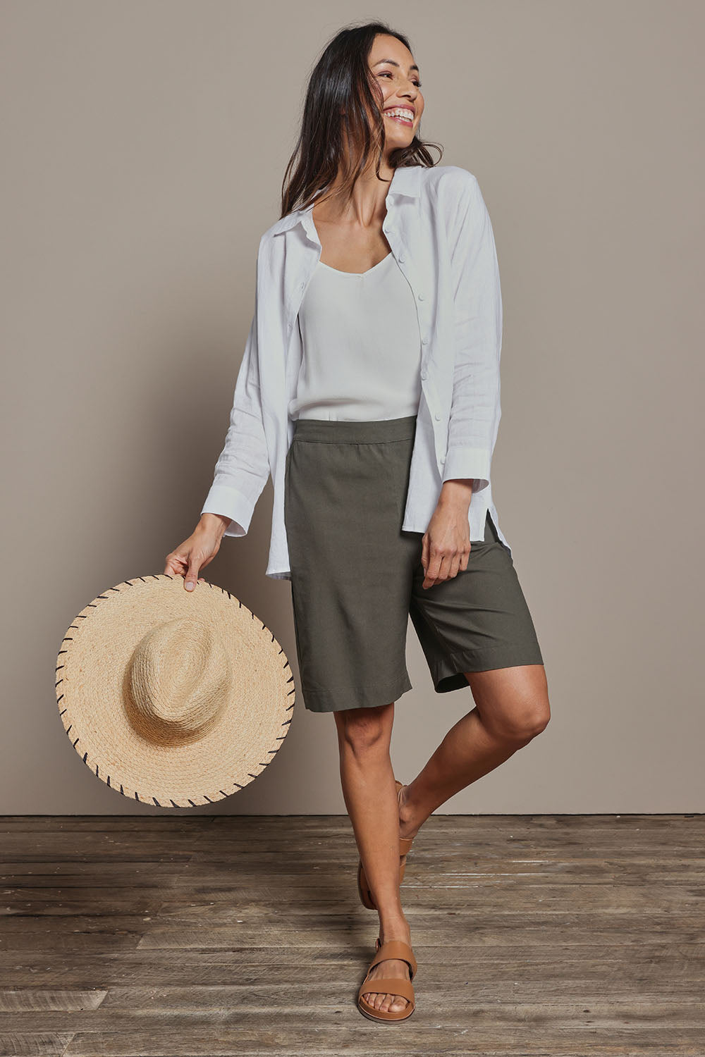 Model Amanda wearing size 10 of the Linen Cotton Pull On Shorts in colour Khaki (Green), from the front, showing the whole outfit