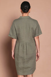 Model Katie wearing size 10 of the Linen Throw On Dress in colour Olive (Green), from the back