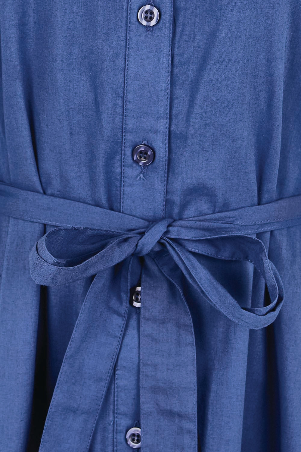 Product shot of the Cotton Broderie Trim Dress – Blue in colour Blue, showing detail