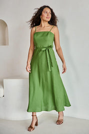 Model Tahneei wearing size 10 of the Linen Riviera Maxi – Green in colour Green, from the front