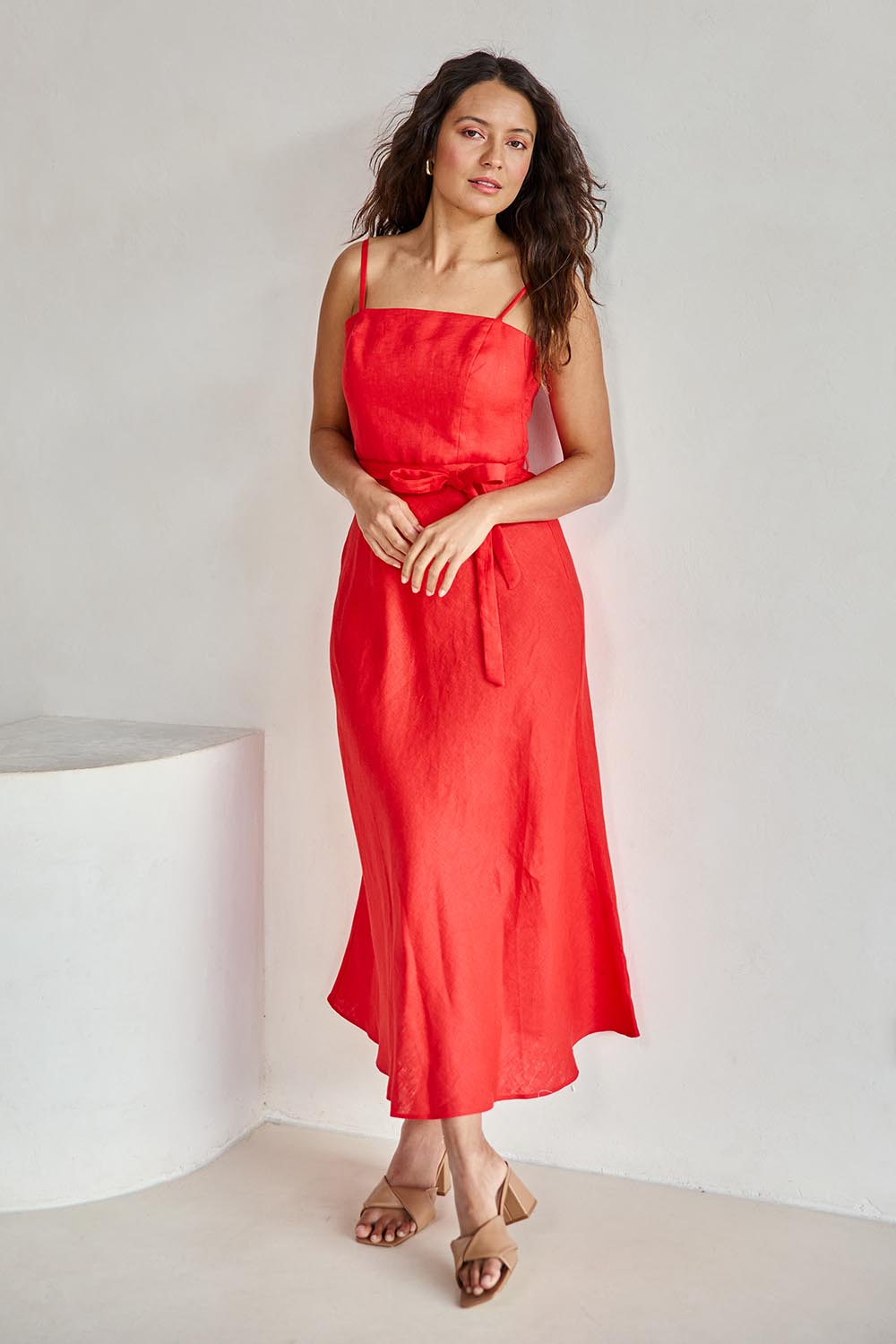 Model Tahneei wearing size 10 of the Linen Riviera Maxi – Red in colour Red, from the front
