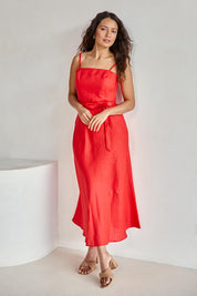 Model Tahneei wearing size 10 of the Linen Riviera Maxi – Red in colour Red, from the front