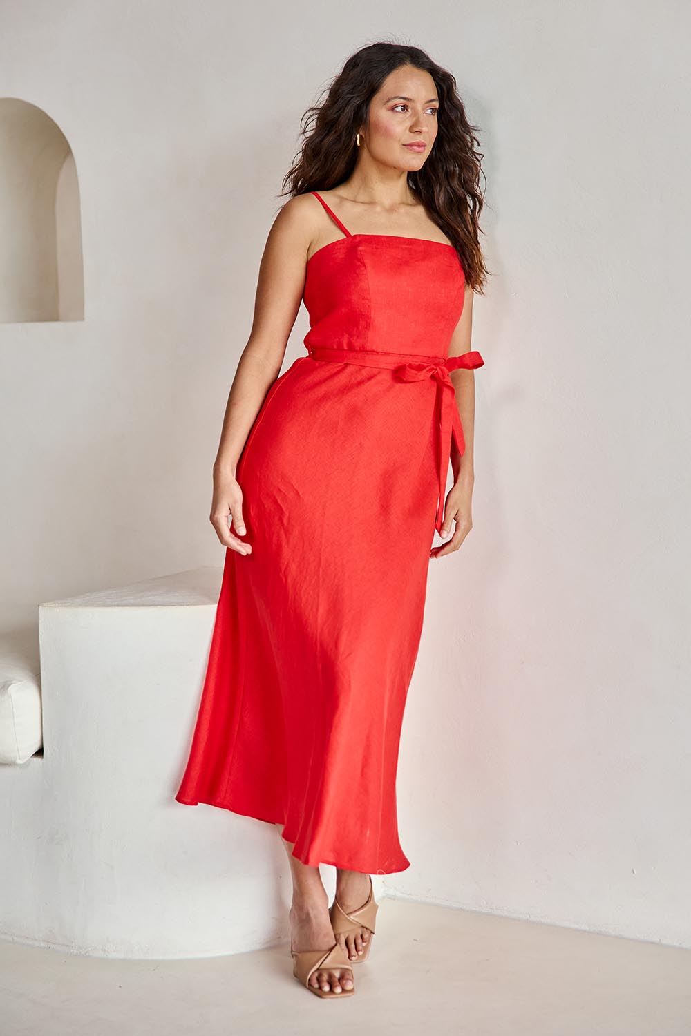Model Tahneei wearing size 10 of the Linen Riviera Maxi – Red in colour Red, from the front