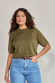 Model Tahneei wearing size 10 of the Linen Lyocell Textured Knit Tee – Green in colour Green, in a cropped view