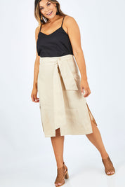 Model Palatina wearing size 14 of the Cotton Linen Waist Tie Skirt in colour Macadamia, from the front, showing the whole outfit