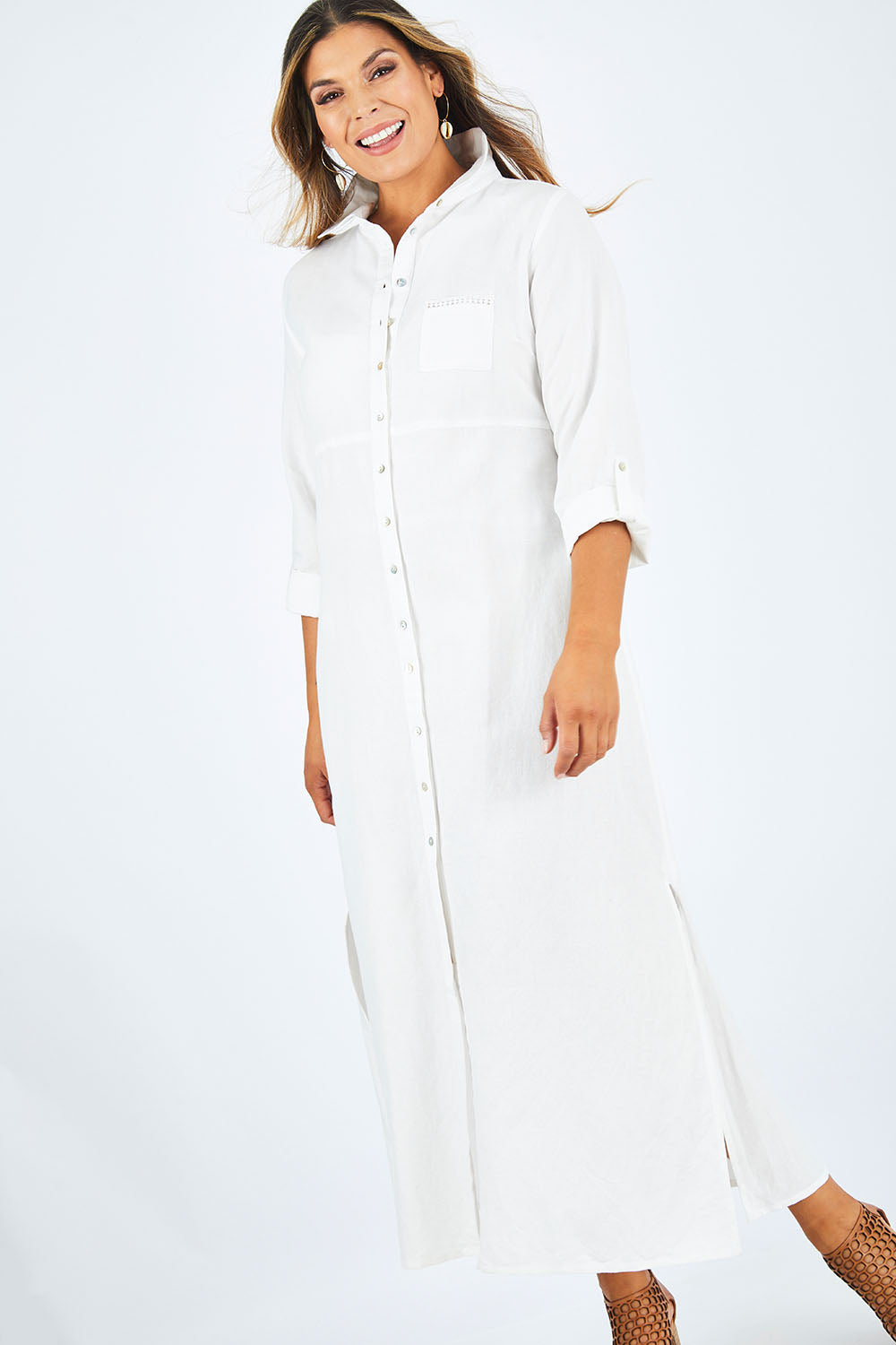 Model Palatina wearing size 14 of the Cotton Linen Longline Shirt in colour Coconut (White), from the front, showing the whole outfit