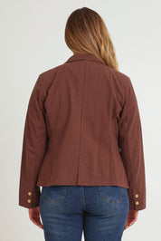 Model Chanel wearing size 16 of the Cotton Linen Blazer in colour Chocolate, from the back
