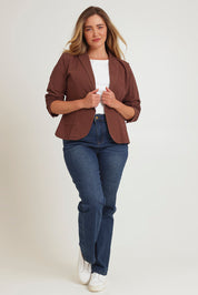 Model Chanel wearing size 16 of the Cotton Linen Blazer in colour Chocolate, from the front, showing the whole outfit