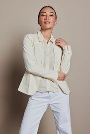 Model Katie wearing size 8 of the Cotton Linen Blazer in colour Cream, from the front, cropped image