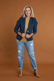 Model Sandy wearing size 10 of the Cotton Linen Blazer in colour Deepocean (Blue), from the front, showing the whole outfit