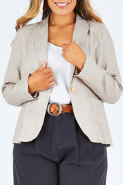 Model Palatina wearing size 14 of the Cotton Linen Blazer in colour Desertsand, from the front, cropped image