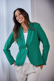 Model Amandam wearing size 10 of the Cotton Linen Blazer - Green in colour Green, from an angle
