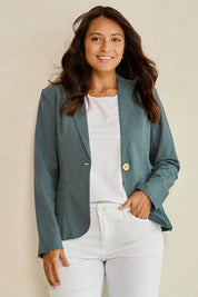Model Tahnee wearing size 10 of the Cotton Linen Blazer in colour Lagoon (Green), from the front, showing the whole outfit